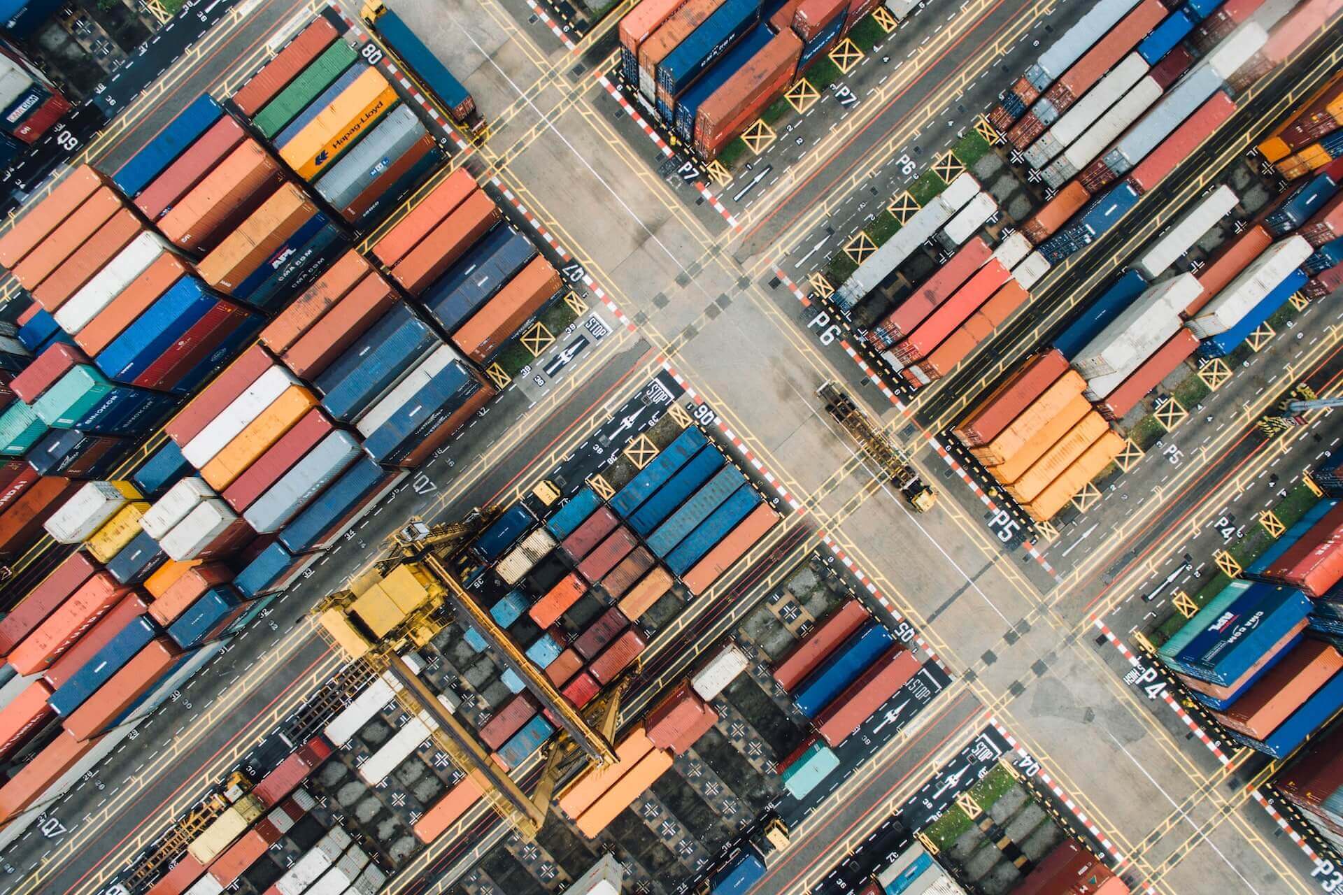 Aerial view from drone over cargo in container yard.