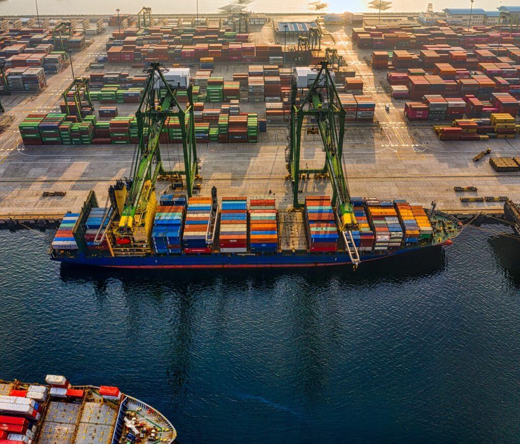 Ship being loaded in cargo port.