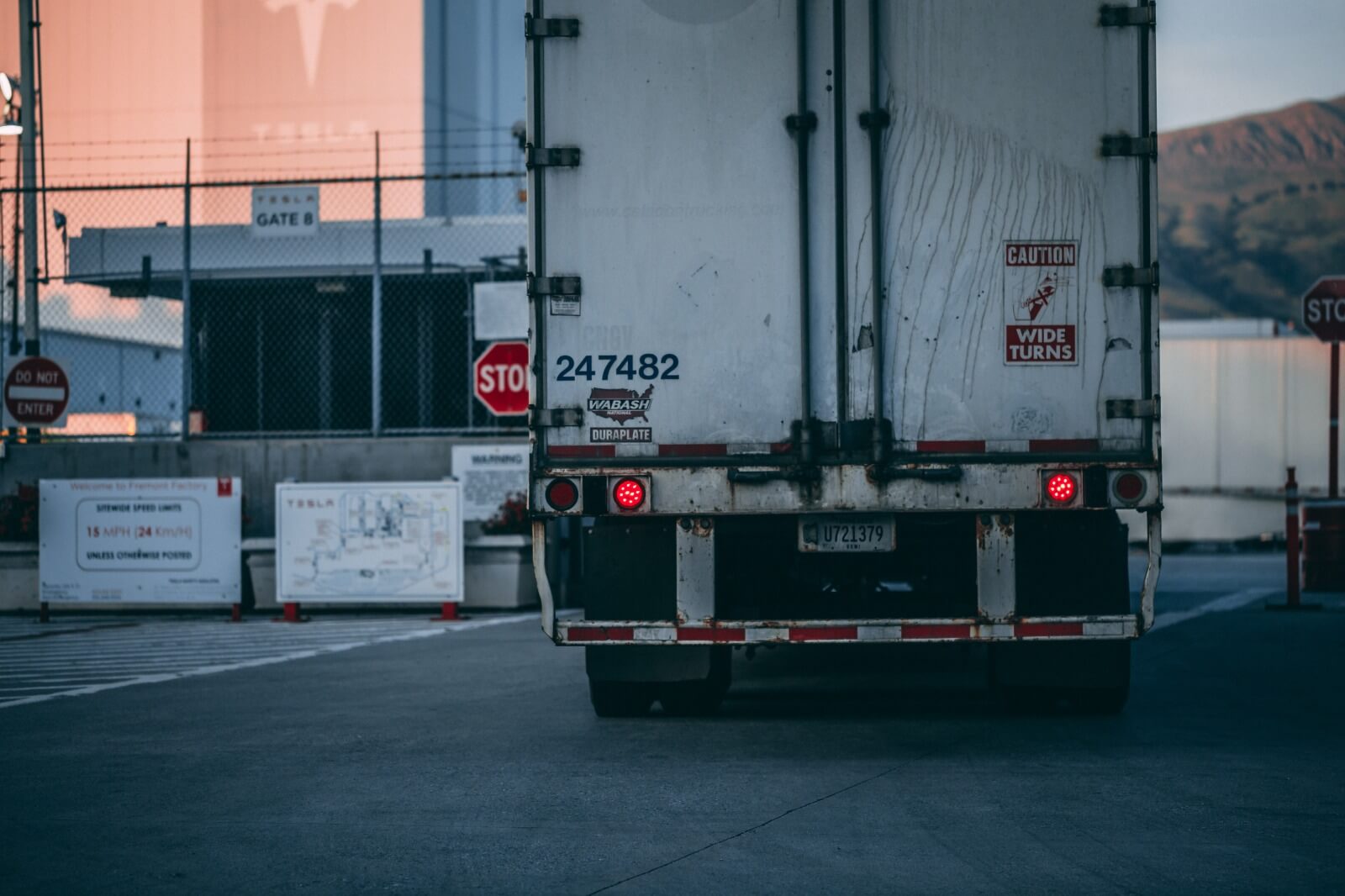 Back view on truck entering gateway.