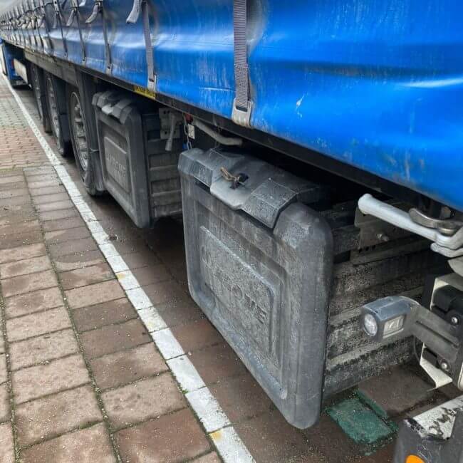 Storage space on truck in-between tires.